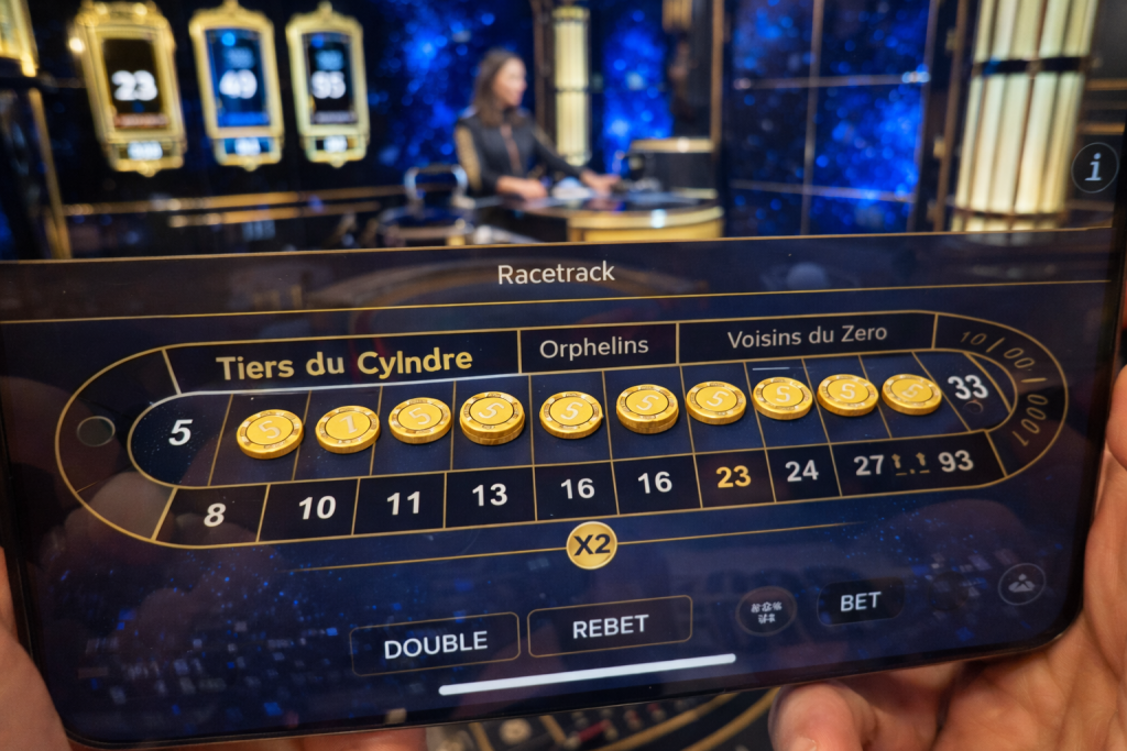 Digital betting interface of Lightning Roulette showing chips placed on the "Tiers" section of the racetrack.